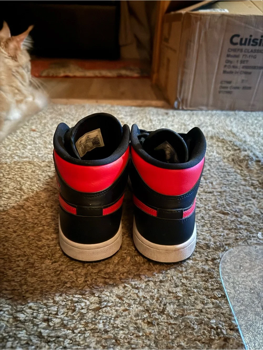Jordan 1 Mid Black and Red Sneakers